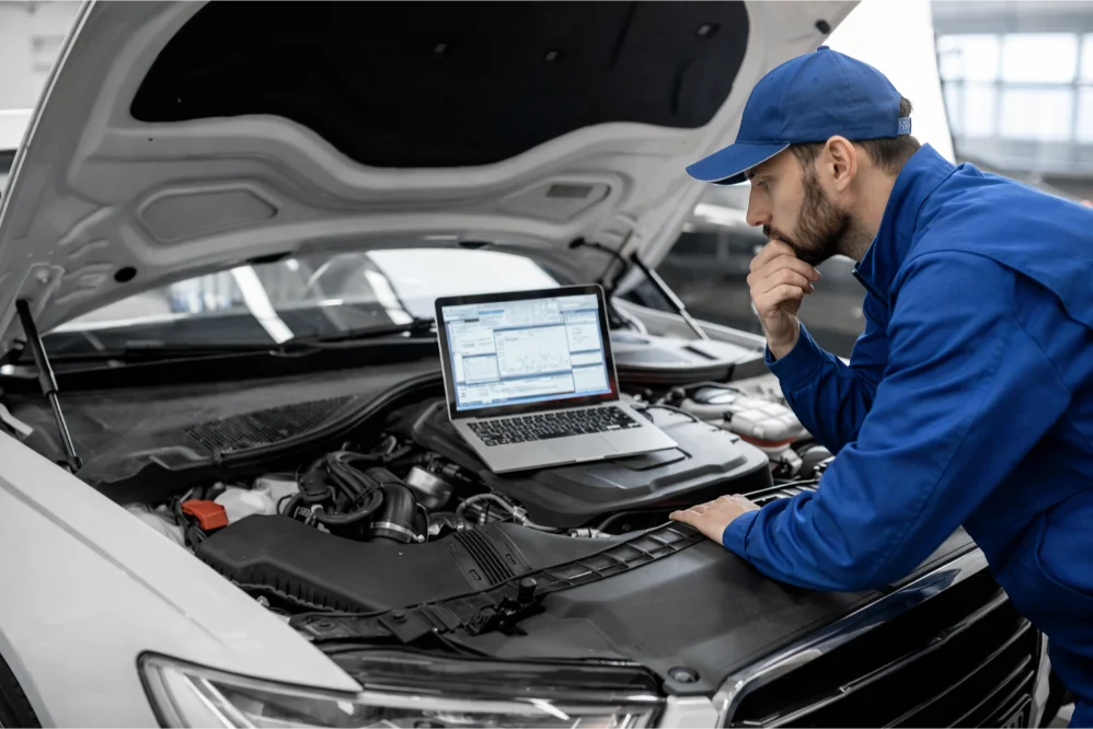 Engine diagnostics laptop inspection